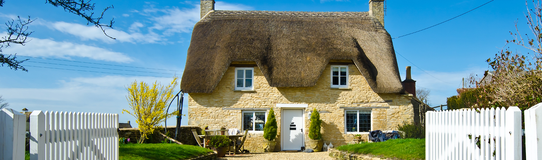 Household Insurance: A charming yellow cottage located in the countryside